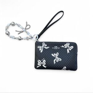 Coach Black Wristlet with Bow Print